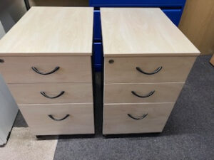 Two used pedestal drawers